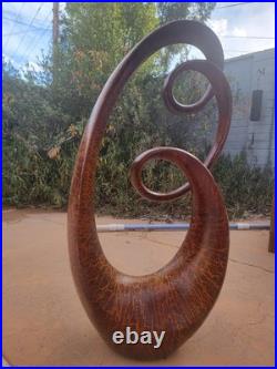 30 Tall Vintage Wood Looking Statue With Double Infinity Curls
