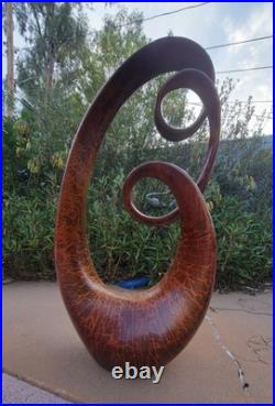 30 Tall Vintage Wood Looking Statue With Double Infinity Curls