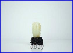 A Russet Jade Carving of'Finger Citron' with Wooden Stand