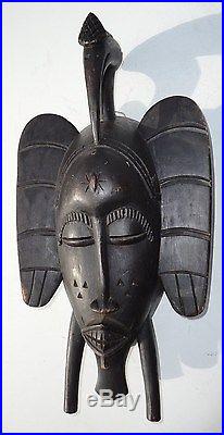 African Wood Mask Ivoirian Hand Carved'Senufo sculptural mask with bird on top