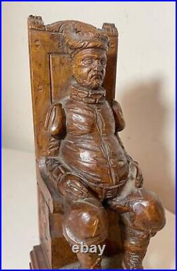 Antique hand carved seated figural seated man wood sculpture statue folk art