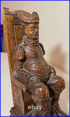 Antique hand carved seated figural seated man wood sculpture statue folk art