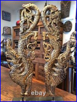 Antique pair of Burmese mythological Pyinsa Rupa gilded wood temple carvings