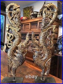 Antique pair of Burmese mythological Pyinsa Rupa gilded wood temple carvings
