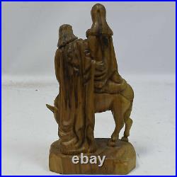 Around 1950 old sculpture of the flight to Egypt, carved wood, height 10,2 in