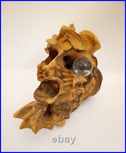 Artisan handcarved wood tree spirit skull carving with glass ball eye signed