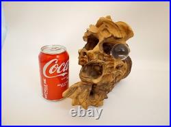 Artisan handcarved wood tree spirit skull carving with glass ball eye signed