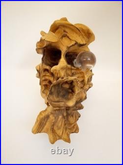 Artisan handcarved wood tree spirit skull carving with glass ball eye signed