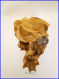 Artisan handcarved wood tree spirit skull carving with glass ball eye signed