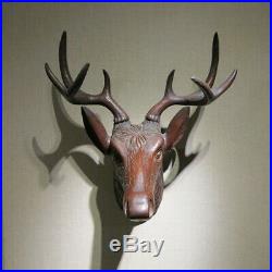 Black Forest German antique carved wood stag head with antlers wall sculpture