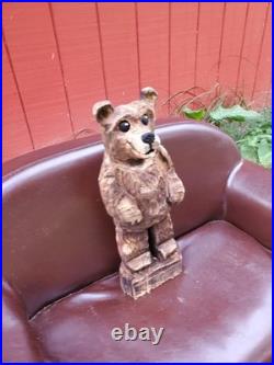 Brown Bear Cub Chainsaw Carving Brown Bear Cub Chainsaw Carving