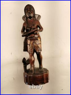 Carving of indigenous woman, carved in noble woods Carving of indigenous woman, carved in noble woods