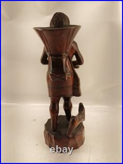 Carving of indigenous woman, carved in noble woods Carving of indigenous woman, carved in noble woods
