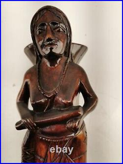 Carving of indigenous woman, carved in noble woods Carving of indigenous woman, carved in noble woods