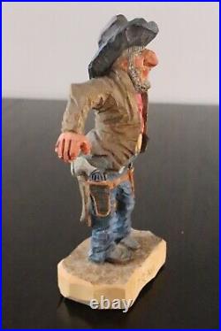Cowboy carving by Dave DeCamp, 10 inches
