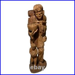 Folk Art Hand Carved Wood Sculpture Of Peddler And His Son LARGE and HEAVY