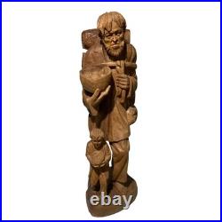 Folk Art Hand Carved Wood Sculpture Of Peddler And His Son LARGE and HEAVY
