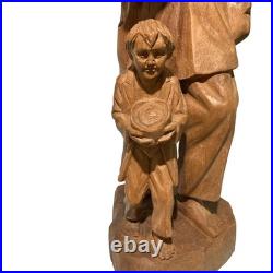 Folk Art Hand Carved Wood Sculpture Of Peddler And His Son LARGE and HEAVY