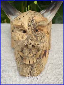 Hand Carved Laughing Ugly Monster with genuine Cow Horns Carved celukuk Figure