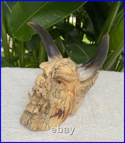 Hand Carved Laughing Ugly Monster with genuine Cow Horns Carved celukuk Figure