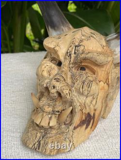 Hand Carved Laughing Ugly Monster with genuine Cow Horns Carved celukuk Figure