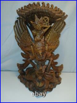Hand Carved Wooden Statue. From The Bali Region