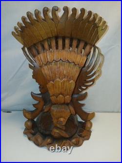 Hand Carved Wooden Statue. From The Bali Region