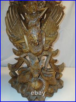 Hand Carved Wooden Statue. From The Bali Region