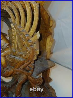 Hand Carved Wooden Statue. From The Bali Region