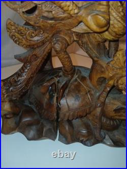Hand Carved Wooden Statue. From The Bali Region