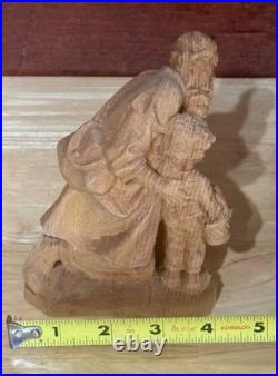 Hand carved sculpture by Hans Schuhegger