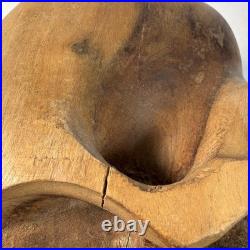 Hand-carved wooden skull sculpture 8'