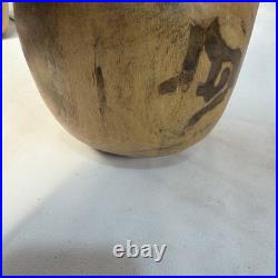 Hand-carved wooden skull sculpture 8'