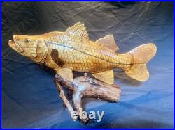 Highly Detailed Snook Fish Wood Carving On Wood Driftwood