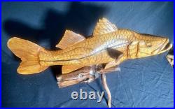 Highly Detailed Snook Fish Wood Carving On Wood Driftwood