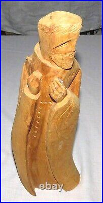 Michael Salazar 13.1/2 inch Wooden Carving of Cloaked Man 1982