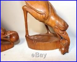 Pair of detailed antique hand carved Asian Balinese wood bird sculpture statues