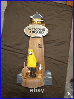 Pudge Degraff Wood Carving Ship Captain, Dog, Seagull on dock With Lighthouse