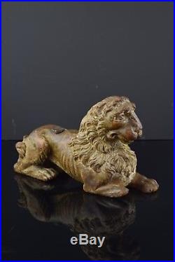 Sculpture in carved wood. Lion lying down. Italy, late 16th century