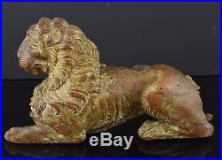 Sculpture in carved wood. Lion lying down. Italy, late 16th century