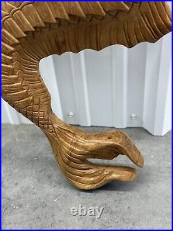 Teak mermaid sculpture