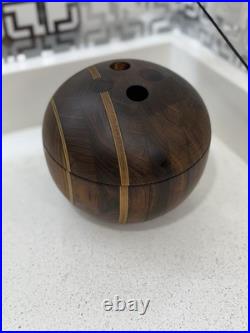 This is a handcrafted segmented wood bowl This is a handcrafted segmented wood bowl
