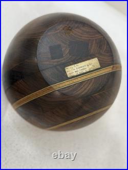 This is a handcrafted segmented wood bowl This is a handcrafted segmented wood bowl