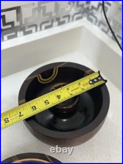 This is a handcrafted segmented wood bowl This is a handcrafted segmented wood bowl