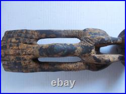 Vintage African figural wooden carving with brass. 27