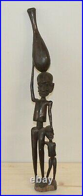 Vintage African hand carving wood statuette man carry vessel on his head