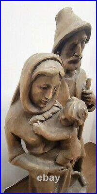 Vintage FOLK ART Hand Carved Wood Man Woman Holding Child 21 Inch