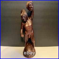 Vintage Hand Carved Wooden Figure Headhunter Holding Head