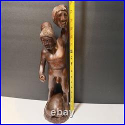 Vintage Hand Carved Wooden Figure Headhunter Holding Head