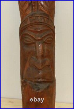 Vintage Indian man hand carving wood statuette